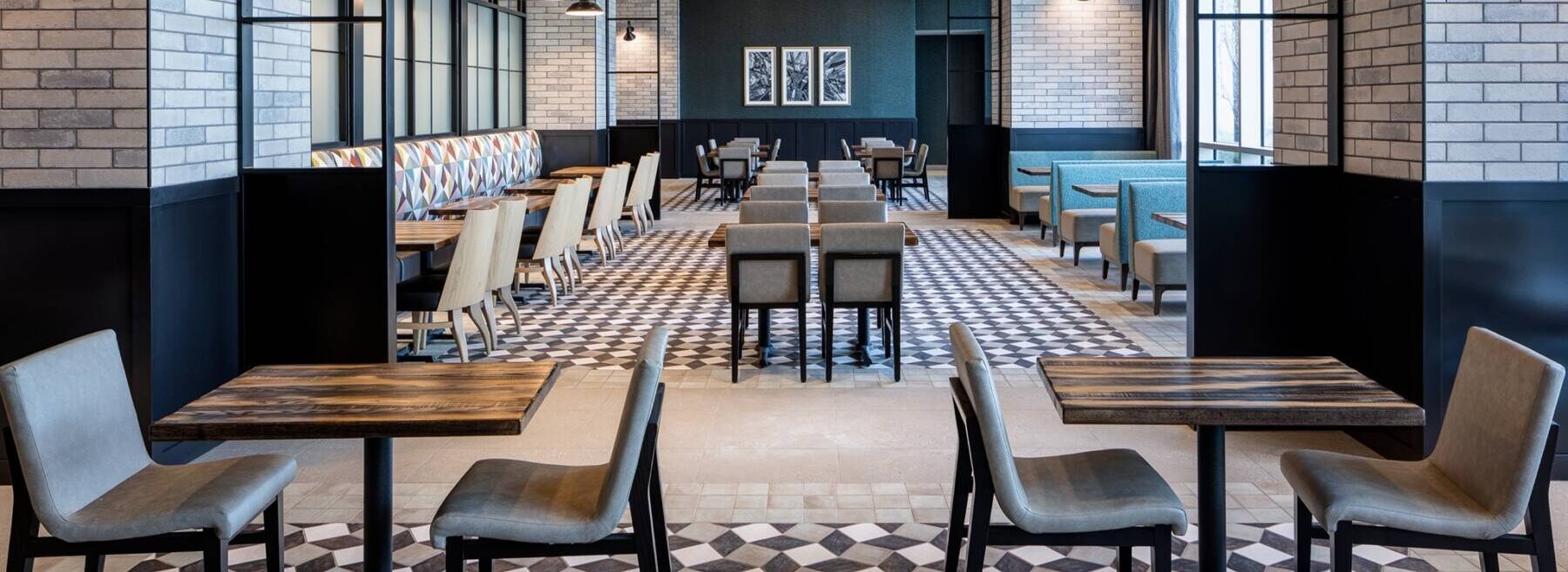 Choctaw Casino & Resort dining area. This image shows geometric patterned tile flooring that illustrates superior flooring installation capabilities.