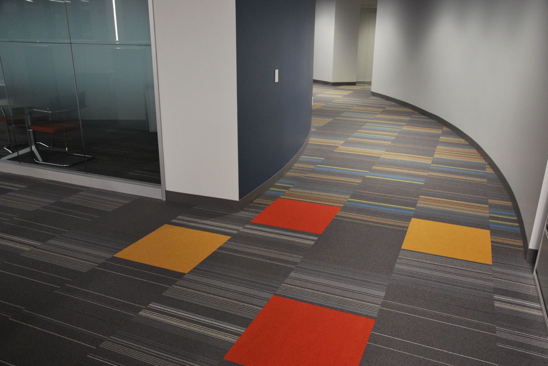 The Joint Commission’s clarity of circulation resulted in a clear path filled with carpet, accent walls, upholstery, and more